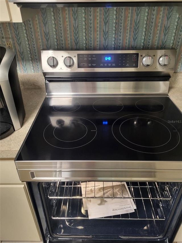 482 Pendleton Pl, Venice, FL 34292 - kitchen view of electric range and light countertops