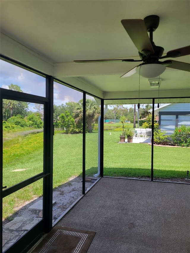 482 Pendleton Pl, Venice, FL 34292 - unfurnished sunroom featuring a ceiling fan and plenty of natural light