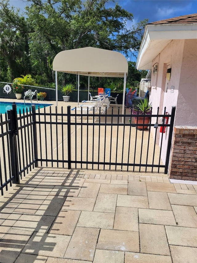 482 Pendleton Pl, Venice, FL 34292 - view of patio with a community pool