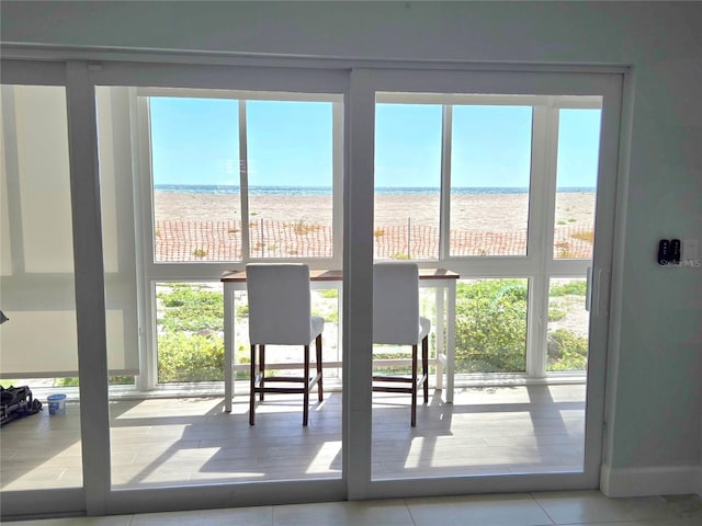 333 The Esplanade N Unit 102, Venice, FL 34285 - entryway with a water view and plenty of natural light