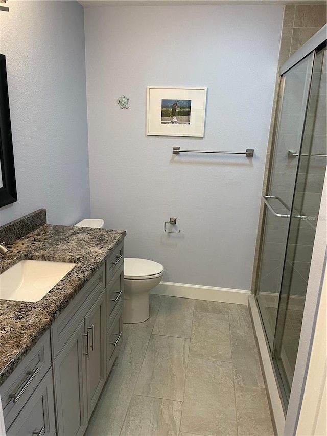 333 The Esplanade N Unit 102, Venice, FL 34285 - full bathroom featuring vanity and a shower stall
