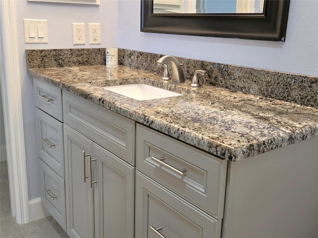 333 The Esplanade N Unit 102, Venice, FL 34285 - bathroom featuring vanity and tile patterned floors