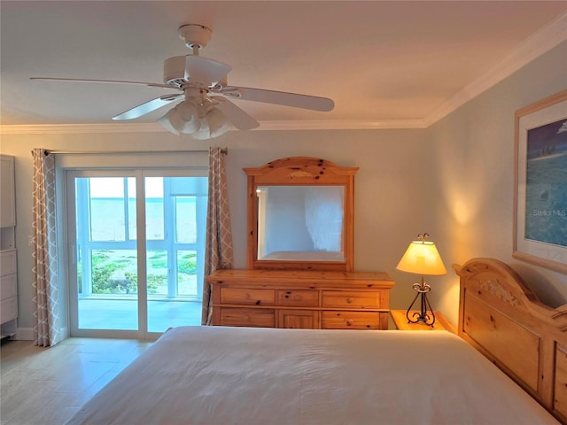 333 The Esplanade N Unit 102, Venice, FL 34285 - bedroom with access to outside, crown molding, and ceiling fan