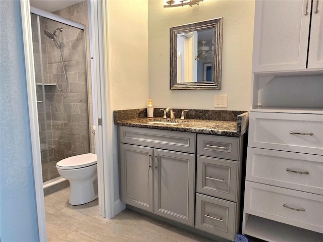 333 The Esplanade N Unit 102, Venice, FL 34285 - full bathroom featuring a shower stall, vanity, and tile patterned floors