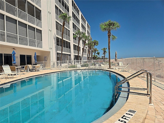 333 The Esplanade N Unit 102, Venice, FL 34285 - community pool featuring a patio