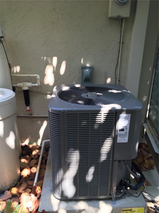 3661 Sterling Rd, Venice, FL 34293 - exterior view of a cooling unit and stucco siding