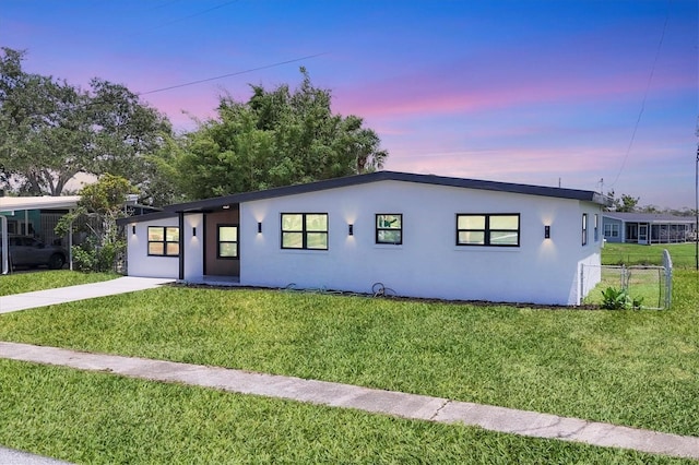 6821 Marius Rd, North Port, FL 34287 - view of front of home featuring stucco siding