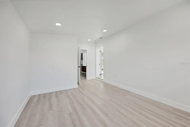 6821 Marius Rd, North Port, FL 34287 - empty room featuring recessed lighting and light wood-type flooring