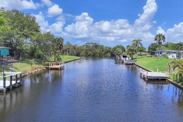 6821 Marius Rd, North Port, FL 34287 - dock featuring a water view and view of wooded area