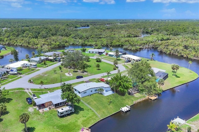 6821 Marius Rd, North Port, FL 34287 - bird's eye view of a forest and a nearby body of water