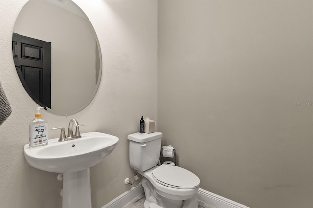 12617 Oak Hill Way, Parrish, FL 34219 - bathroom with baseboards and toilet