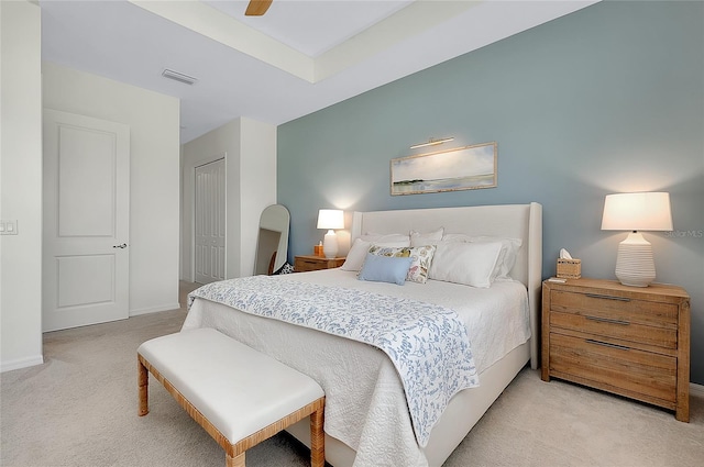 17525 Jadestone Ct, Venice, FL 34293 - bedroom featuring light colored carpet, a closet, and a ceiling fan