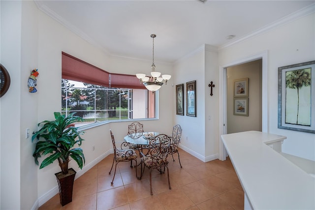 4308 Via Del Santi, Venice, FL 34293 - dining space featuring a chandelier, crown molding, and tile patterned floors