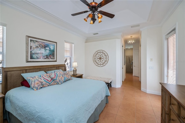 4308 Via Del Santi, Venice, FL 34293 - bedroom featuring a tray ceiling, light tile patterned flooring, ceiling fan, and crown molding