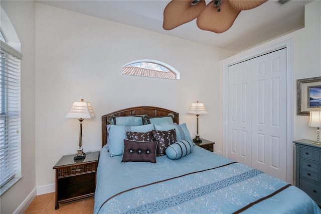 4308 Via Del Santi, Venice, FL 34293 - bedroom featuring a closet, tile patterned flooring, and a ceiling fan