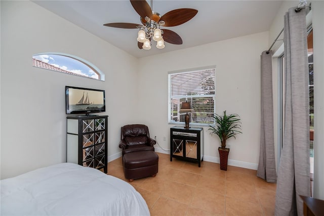 4308 Via Del Santi, Venice, FL 34293 - bedroom featuring multiple windows, light tile patterned flooring, and ceiling fan