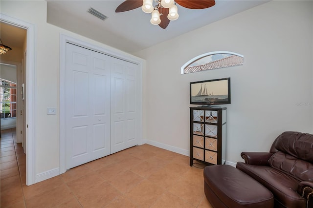 4308 Via Del Santi, Venice, FL 34293 - living area featuring ceiling fan and light tile patterned floors