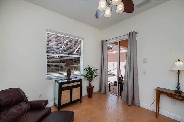 4308 Via Del Santi, Venice, FL 34293 - sitting room with a ceiling fan and light tile patterned flooring