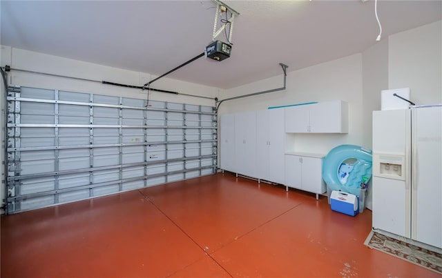 4308 Via Del Santi, Venice, FL 34293 - garage featuring a garage door opener
