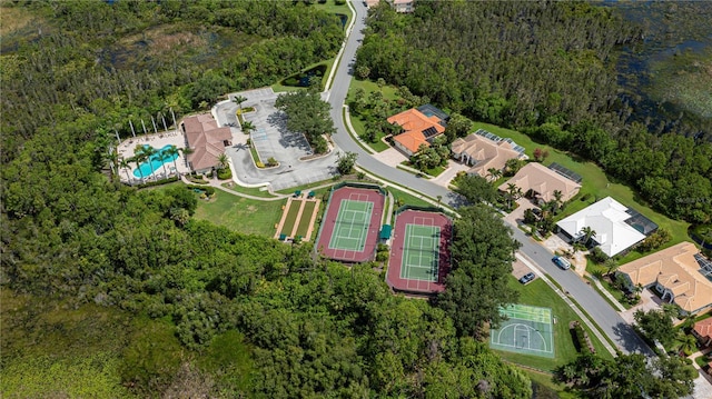 4308 Via Del Santi, Venice, FL 34293 - view of property location featuring a forest and a pool area