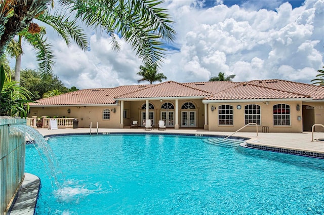 4308 Via Del Santi, Venice, FL 34293 - community pool featuring french doors and a patio