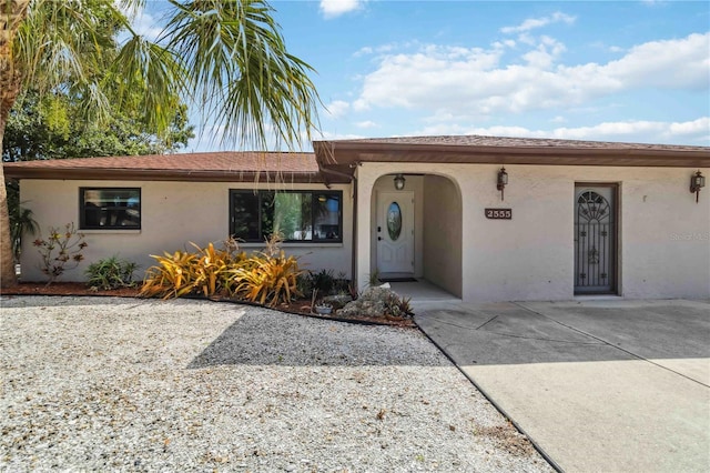 2555 Yucca Rd, Venice, FL 34293 - ranch-style home featuring stucco siding