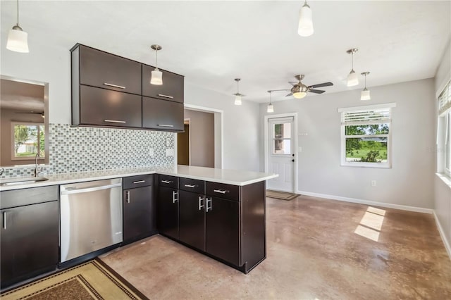 2555 Yucca Rd, Venice, FL 34293 - kitchen with dishwasher, a peninsula, concrete floors, tasteful backsplash, and a ceiling fan