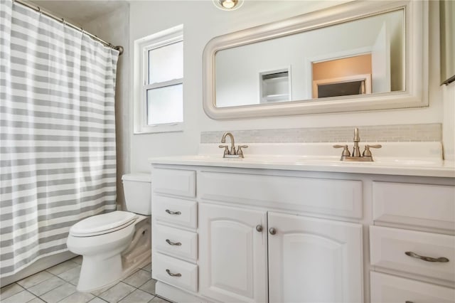 2555 Yucca Rd, Venice, FL 34293 - bathroom featuring vanity, tile patterned flooring, decorative backsplash, and curtained shower