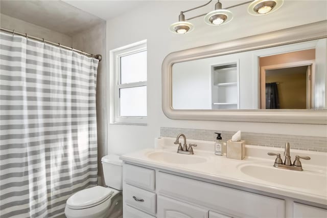2555 Yucca Rd, Venice, FL 34293 - full bath with double vanity, backsplash, and a shower with curtain