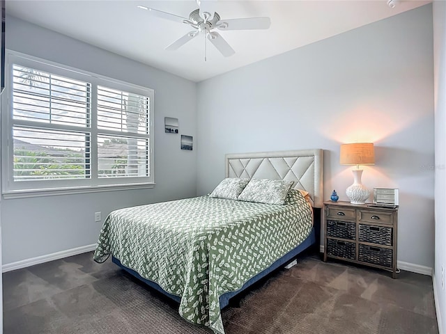 20749 Swallowtail Ct, Venice, FL 34293 - carpeted bedroom featuring baseboards and a ceiling fan