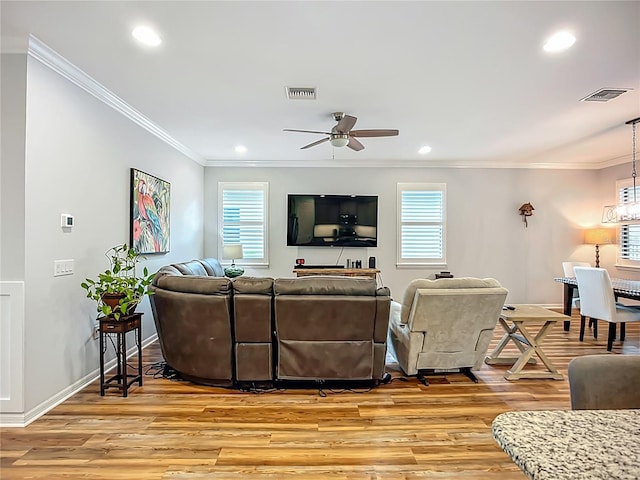 20749 Swallowtail Ct, Venice, FL 34293 - living room with ceiling fan, crown molding, light wood finished floors, and recessed lighting