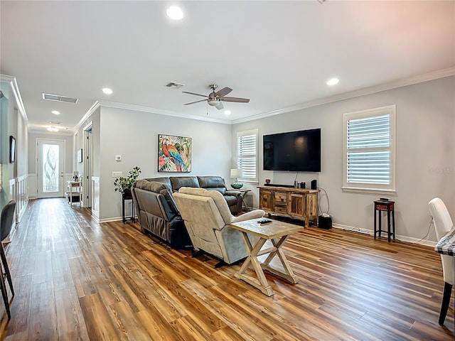 20749 Swallowtail Ct, Venice, FL 34293 - living room featuring crown molding, a ceiling fan, wood finished floors, and recessed lighting