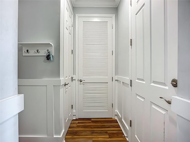 20749 Swallowtail Ct, Venice, FL 34293 - doorway with ornamental molding and dark wood-style floors