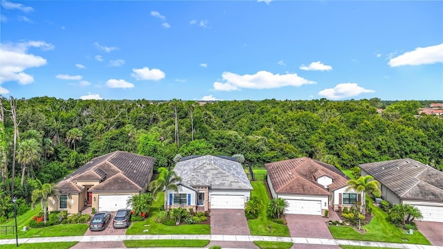 20749 Swallowtail Ct, Venice, FL 34293 - aerial view of property and surrounding area featuring a heavily wooded area