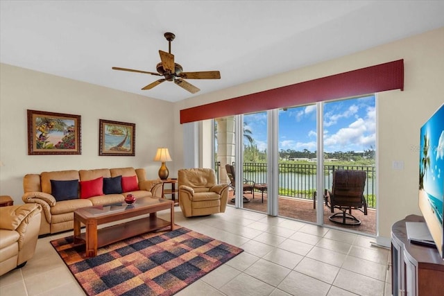 157 Tampa Ave E Unit 305, Venice, FL 34285 - living area featuring light tile patterned floors and ceiling fan