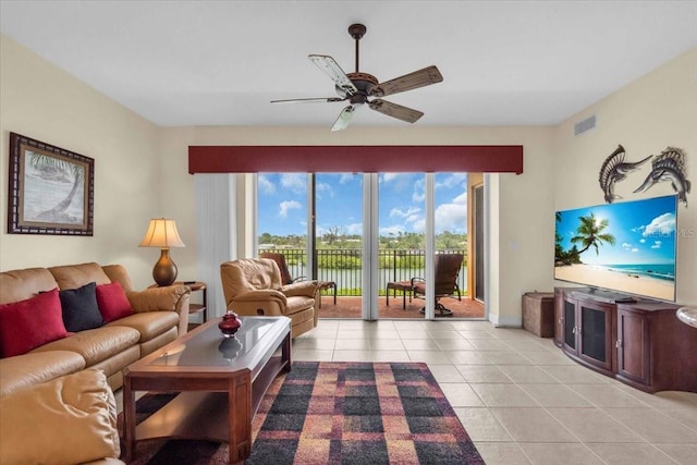 157 Tampa Ave E Unit 305, Venice, FL 34285 - living room with light tile patterned flooring and a ceiling fan