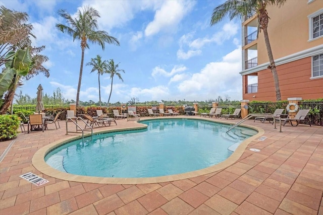 157 Tampa Ave E Unit 305, Venice, FL 34285 - community pool featuring a patio area