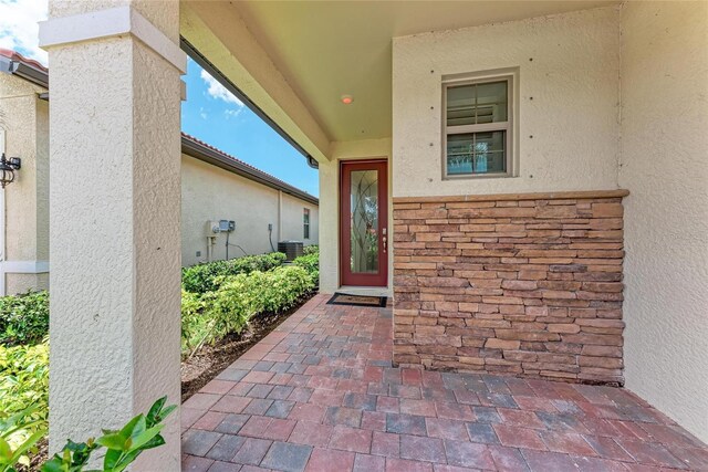 257 Teramo Way, Nokomis, FL 34275 - property entrance featuring stucco siding