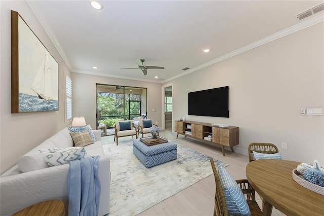 257 Teramo Way, Nokomis, FL 34275 - living area featuring recessed lighting, ceiling fan, ornamental molding, and wood finished floors