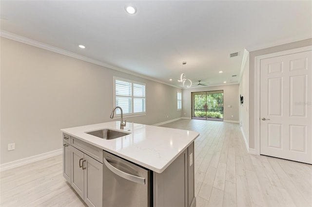 257 Teramo Way, Nokomis, FL 34275 - kitchen featuring stainless steel dishwasher, ornamental molding, open floor plan, light wood finished floors, and gray cabinetry