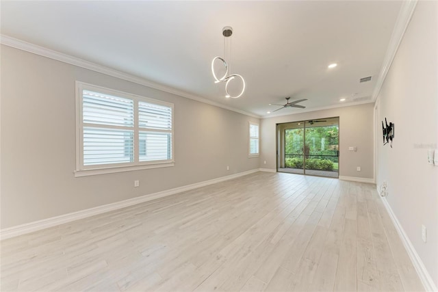 257 Teramo Way, Nokomis, FL 34275 - spare room featuring ornamental molding, a ceiling fan, light wood finished floors, and recessed lighting