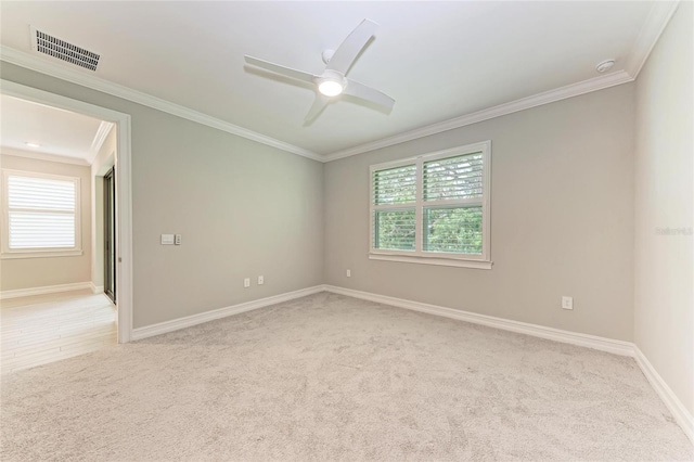 257 Teramo Way, Nokomis, FL 34275 - unfurnished room with plenty of natural light, light carpet, ornamental molding, and ceiling fan