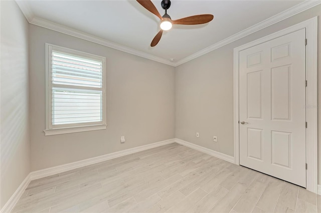 257 Teramo Way, Nokomis, FL 34275 - spare room with light wood finished floors, ceiling fan, and crown molding
