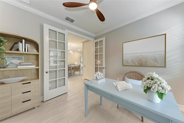 257 Teramo Way, Nokomis, FL 34275 - home office featuring crown molding, ceiling fan, french doors, and light wood-style flooring