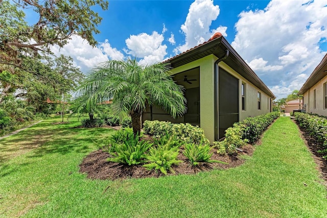 257 Teramo Way, Nokomis, FL 34275 - view of side of property featuring stucco siding and a lawn