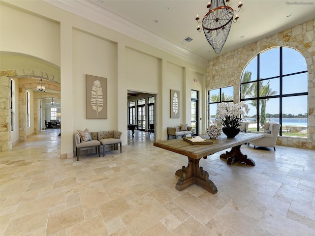 257 Teramo Way, Nokomis, FL 34275 - common area featuring a towering ceiling and a water view