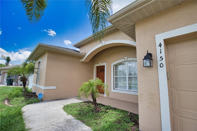 4150 Otoole St, North Port, FL 34291 - entrance to property with stucco siding