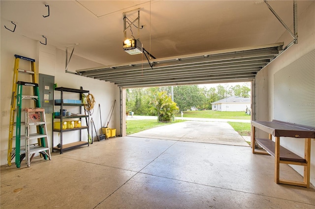 4150 Otoole St, North Port, FL 34291 - garage with electric panel and a garage door opener