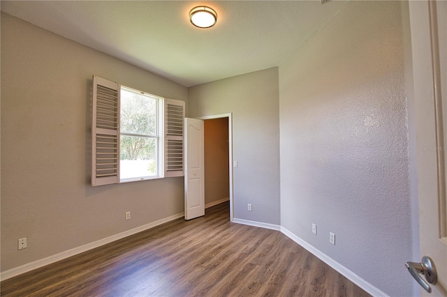 4150 Otoole St, North Port, FL 34291 - unfurnished room featuring dark wood finished floors and baseboards