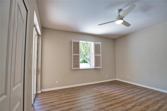 4150 Otoole St, North Port, FL 34291 - unfurnished bedroom with dark wood-style flooring and ceiling fan